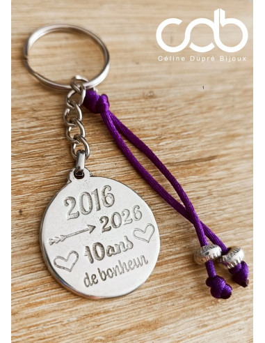Porte clés en étain - 2016/2026 + 10 ans de...