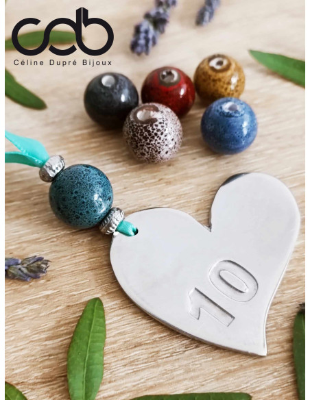 Coeur à suspendre en étain brut 42x46mm