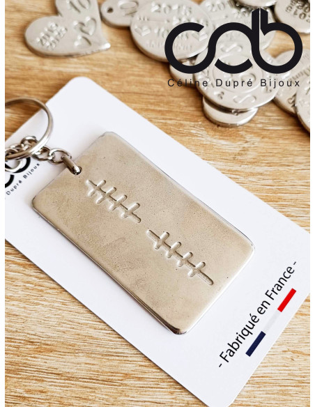 Porte clés étain brut avec "10 en bâtons" - 1 médaille rectangle 35x60mm