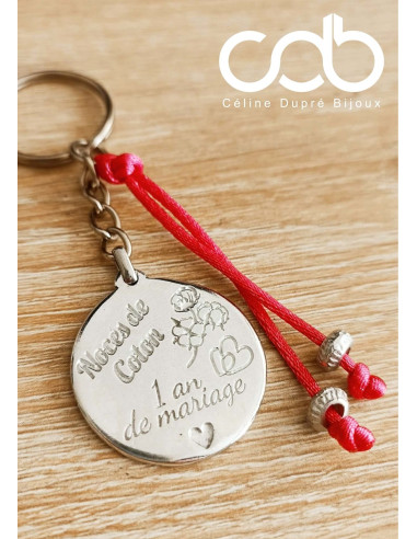 Porte clés avec cordon rose foncé